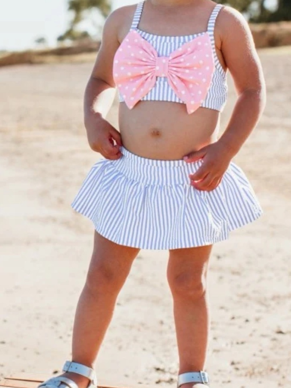 Ruffle Butts Periwinkle Blue Striped Swim Skirt with Pink Bow Top